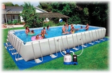 Каркасный бассейн прямоугольный Intex 28376, размер  975 x 488 x 132 см в комплекте: (песочный насос-фильтр с хлоргенератором, лестница, тент, подложка, сачок, скиммер, волейбольная сетка) 